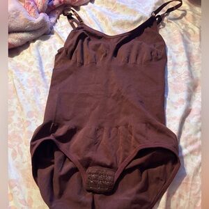 brown cinching body suit
